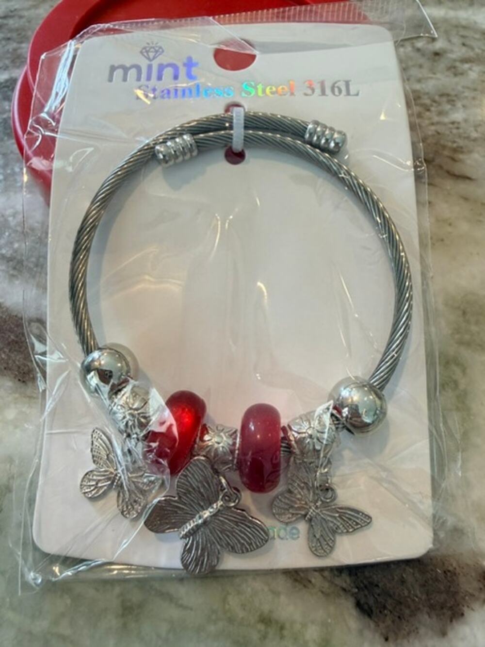 The "Cayman" Flutter Charm Bracelet - Stainless Steel and Adjustable